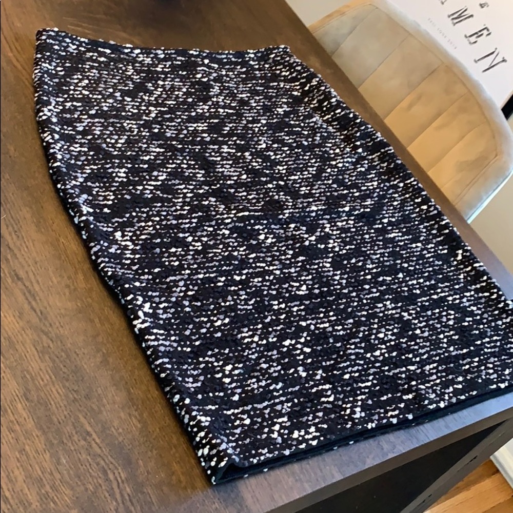 St. John Black, grey/white details professional.